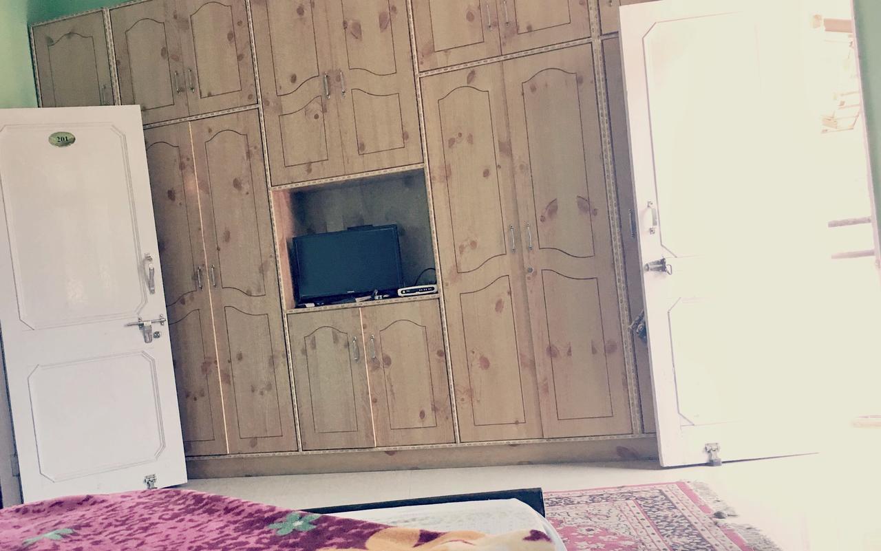 Anand Homestay Chail Esterno foto
